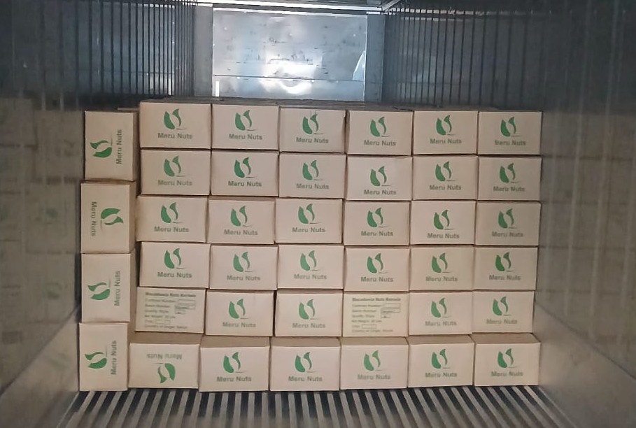 Stacked Meru Nuts cartons in warehouse